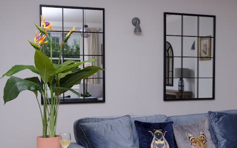 Artificial bird of paradise in blue living room