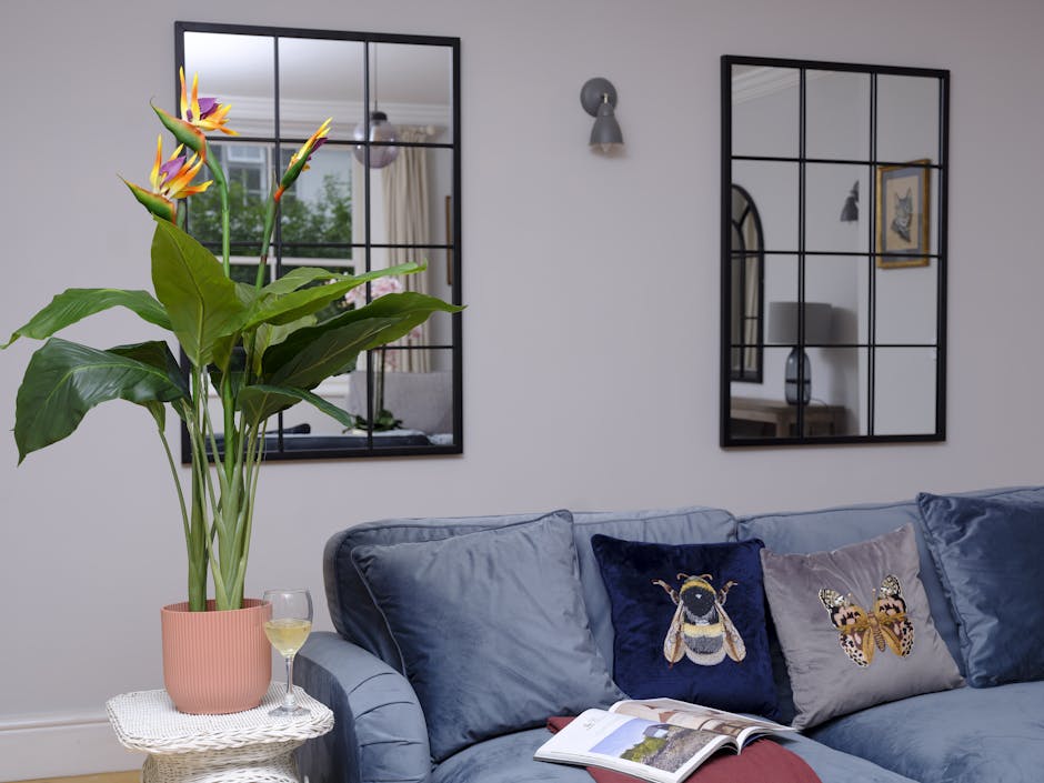 Artificial bird of paradise in blue living room