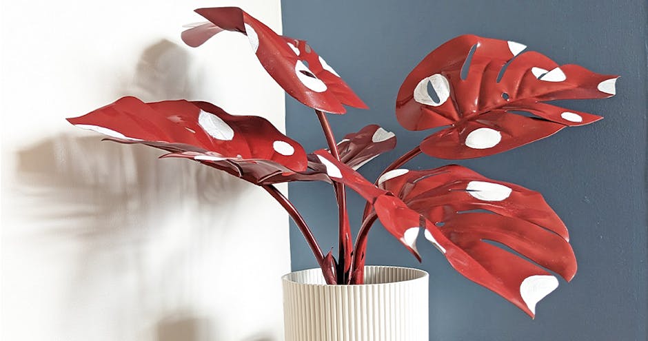 Red polka dot painted artificial plant