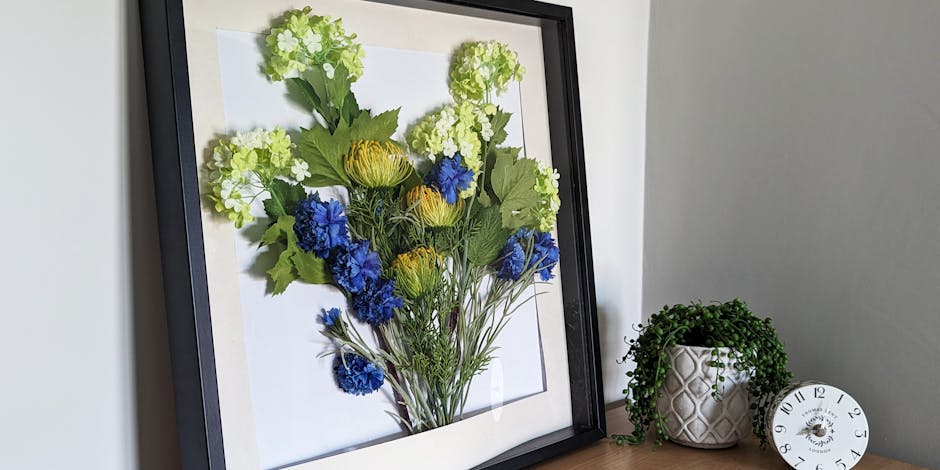 Artificial bouquet in shadow box frame