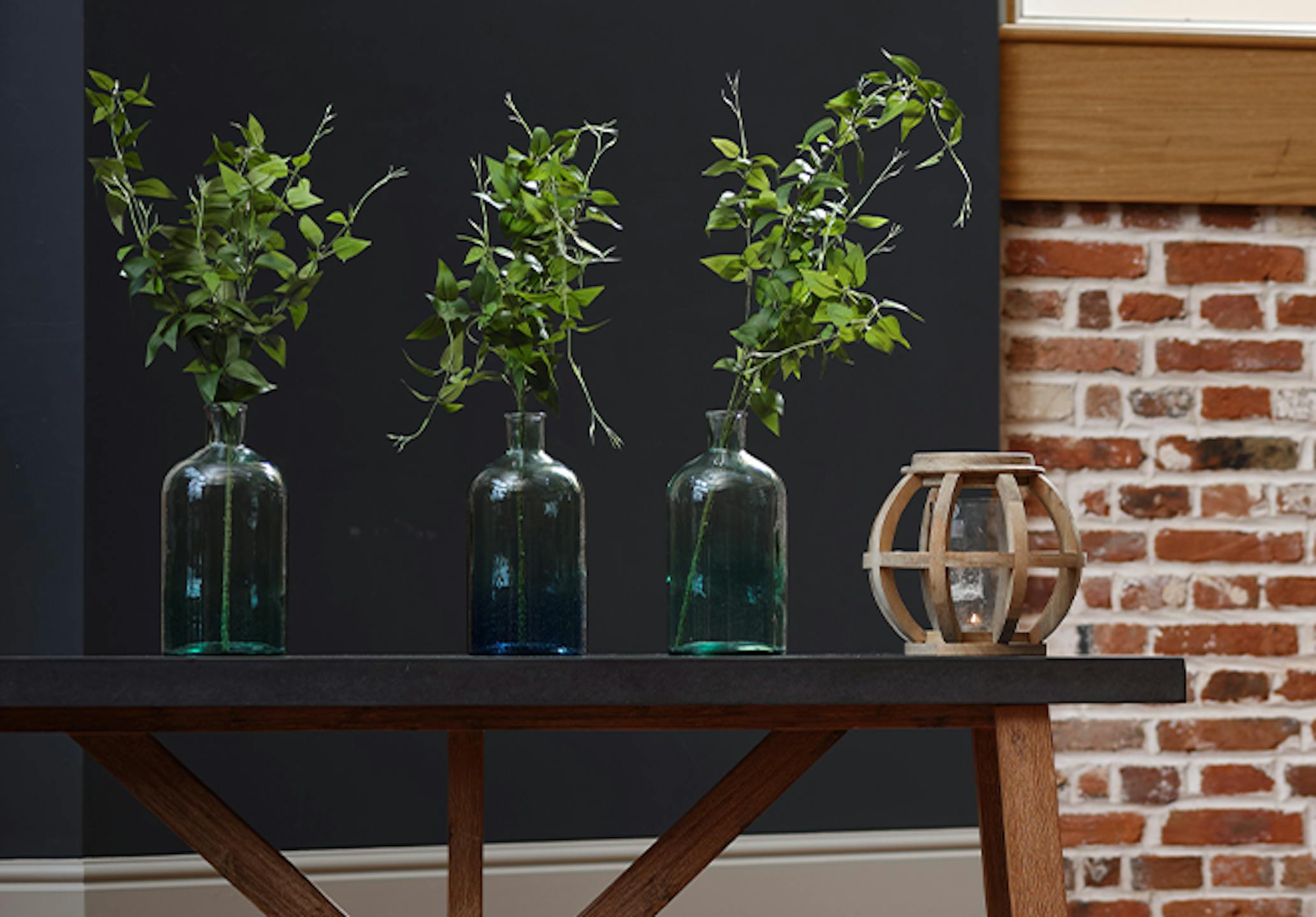 Artificial clematis sprays on blue bench