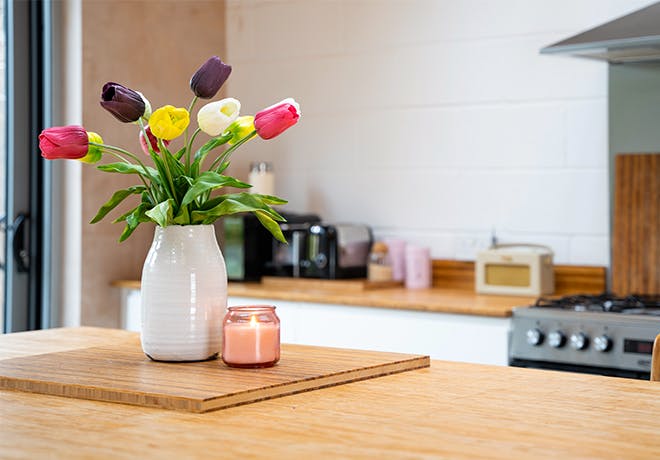 Artificial tulip bunch in kitchen