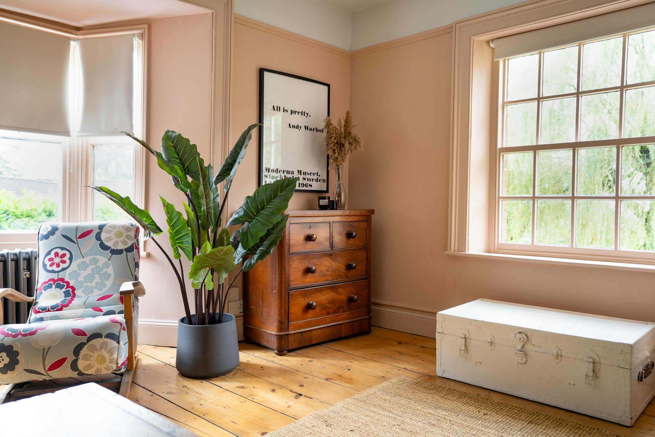Artificial elephant ear plant in bedroom