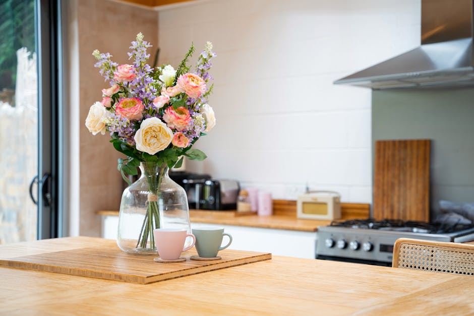 Faux pretty pastels bouquet on wooden kitchen island