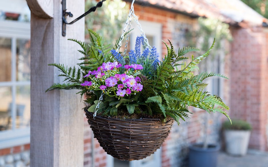 Artificial wild flower hanging basket at front door