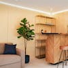 Artificial fiddle leaf fig tree in wooden bar