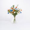 Faux meadow bouquet in glass vase