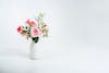Faux serenity bunch in white vase