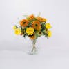 Artificial tequila sunrise bouquet in glass vase