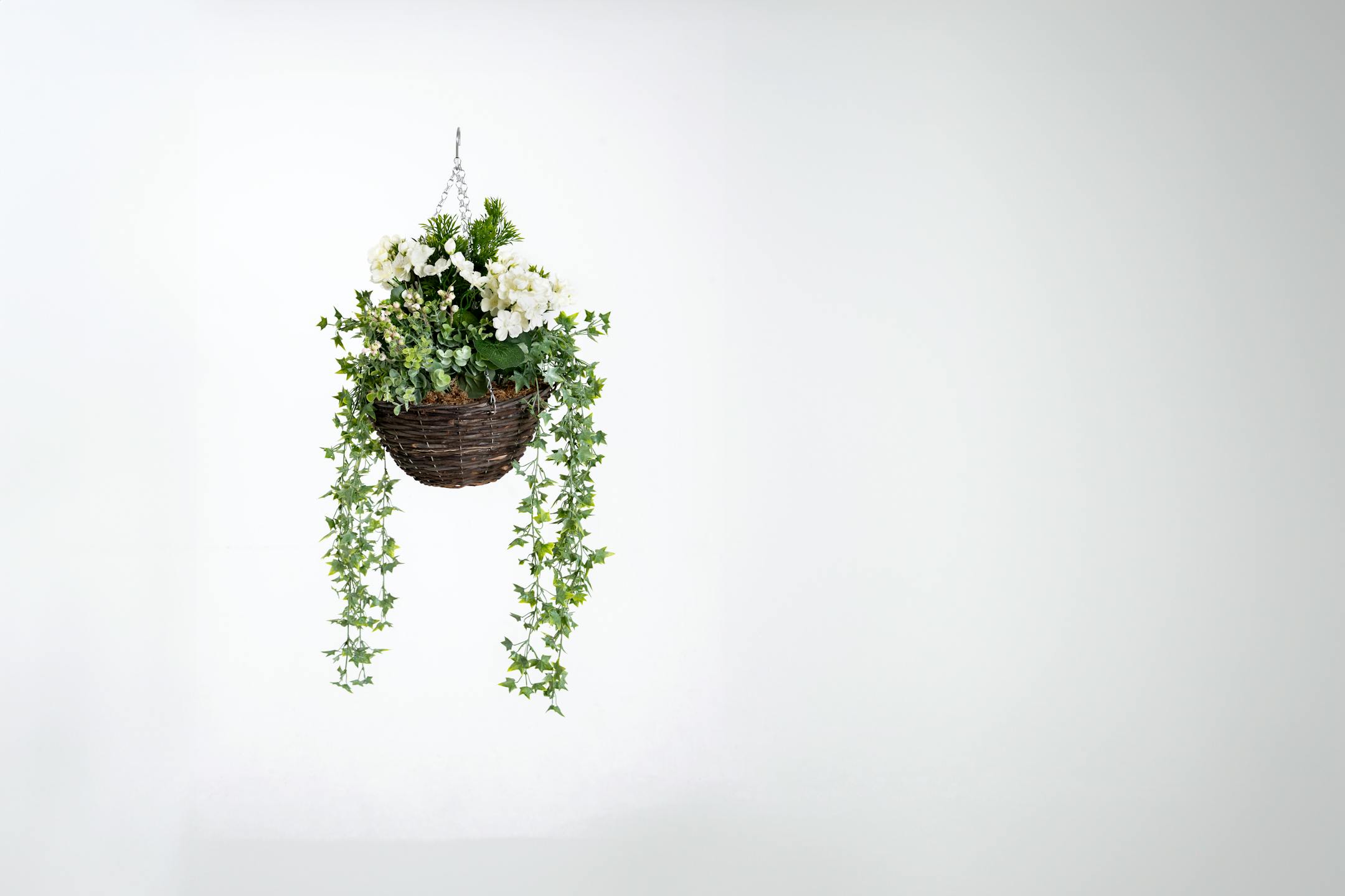 Artificial cream wild berry and geranium hanging basket