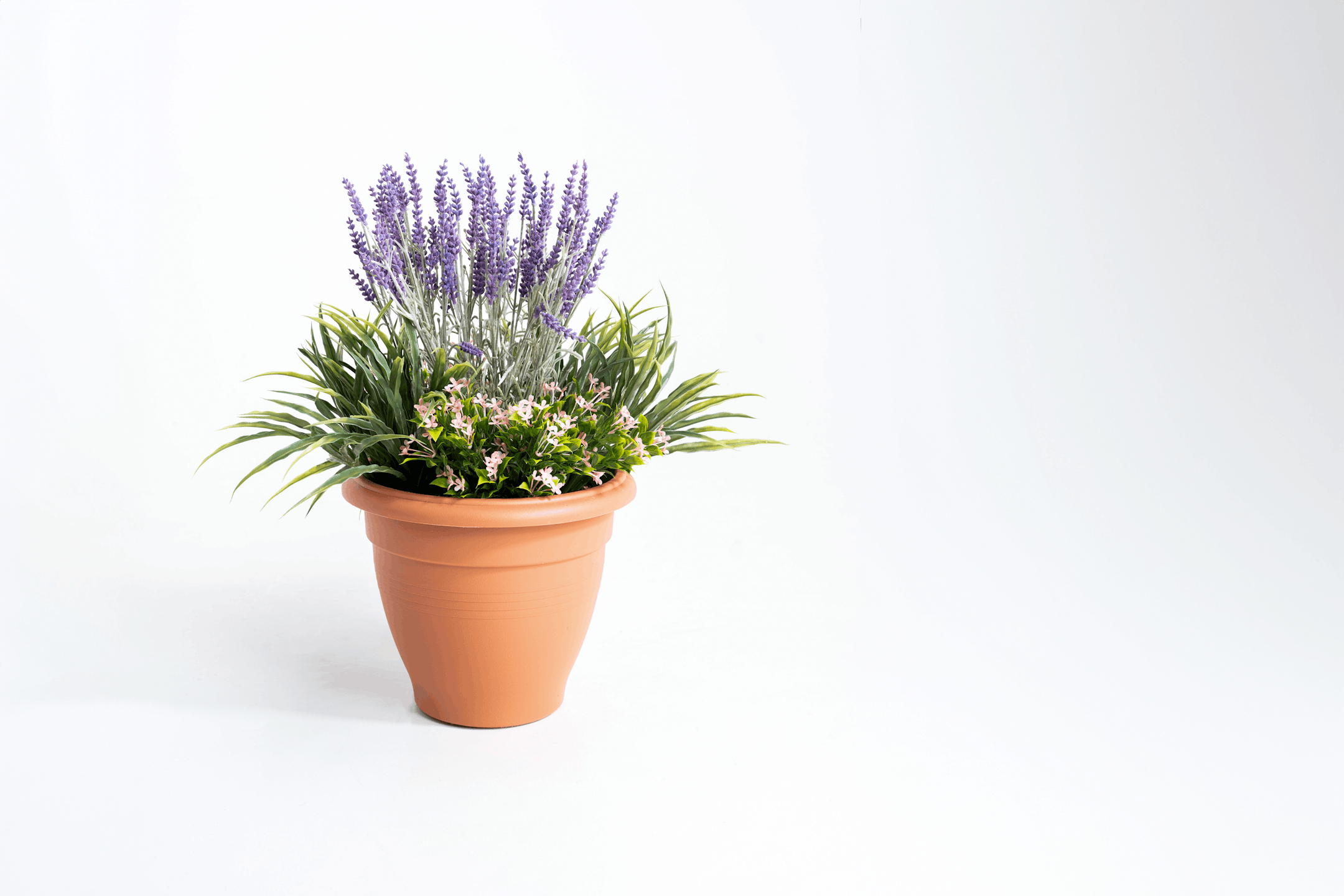 Artificial starflower and lavender patio tub