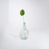Artificial pothos leaf in glass vase