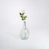 White pink artificial rose stem in glass vase