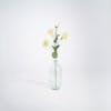 Cream artificial lisianthus stem in glass vase