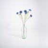 Three blue artificial cornflower stems
