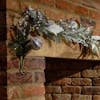 Champagne celebrations garland over fireplace