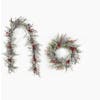 Artificial winter frost berry and pine wreath and garland bundle on white background