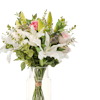Artificial elegance bouquet in a glass vase