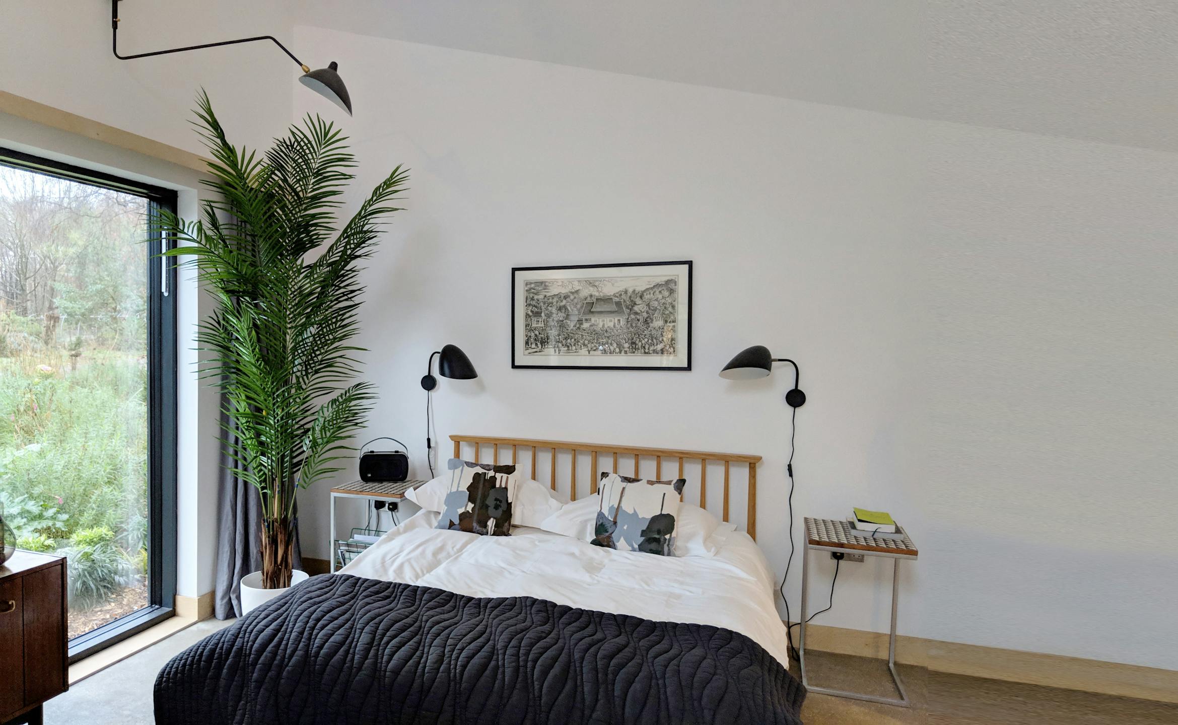 Artificial giant areca palm in a bedroom