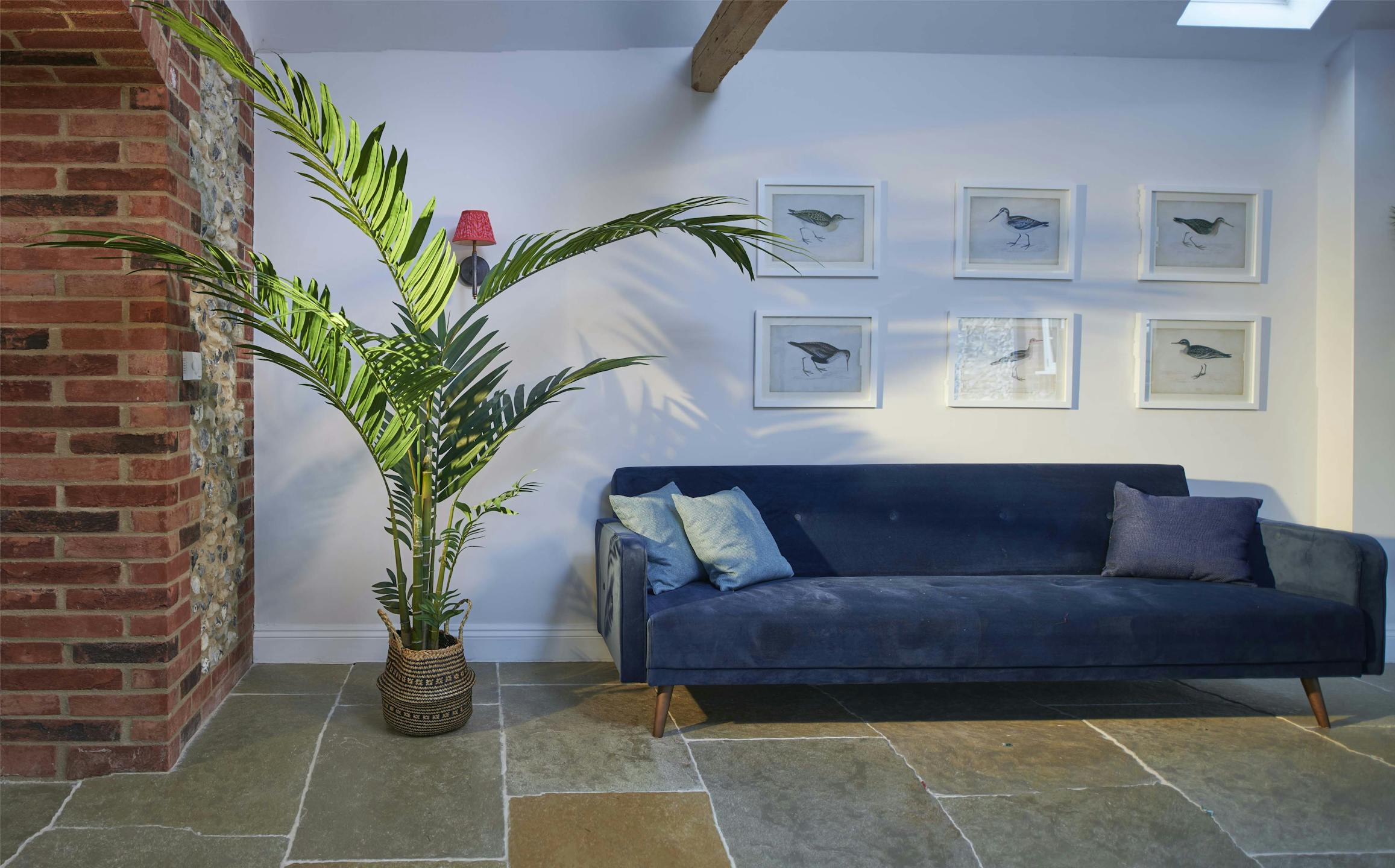 Artificial 200cm 7ft kentia palm in blue living space