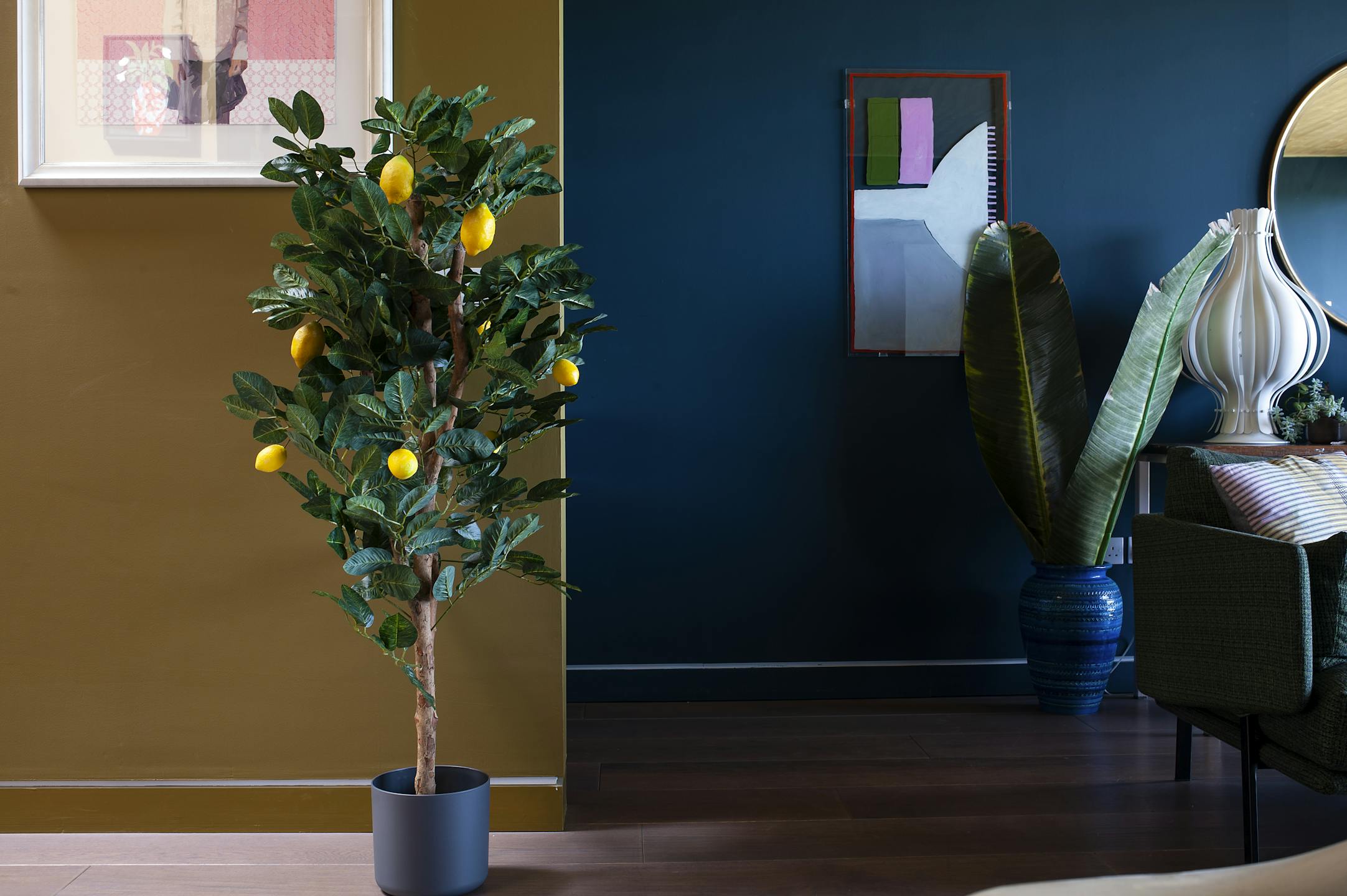 Artificial lemon tree in colourful interior