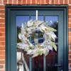 Nordic style Christmas wreath on front door