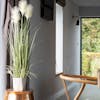 Artificial pampas grass on copper stand