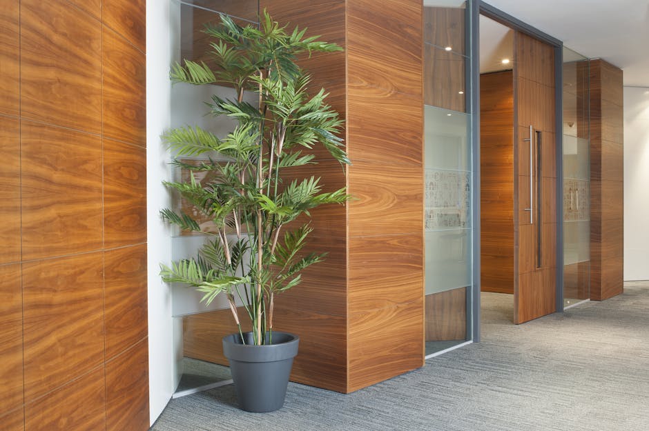 Artificial parlour palm in office space
