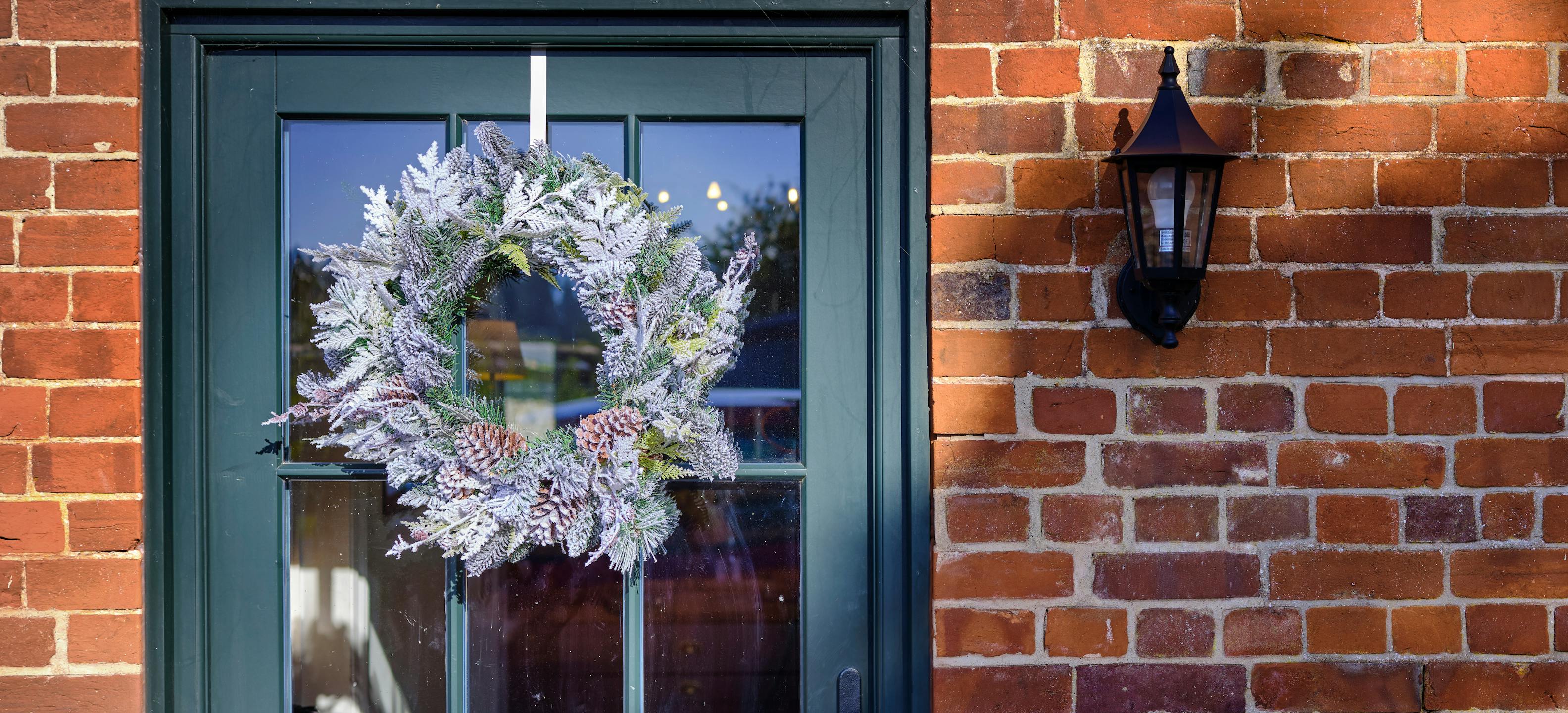 Siberian festive wreath on green front door