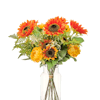 Artificial tequila sunrise bouquet in a glass vase