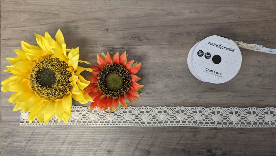 Sunflowers and woven ribbon on a table