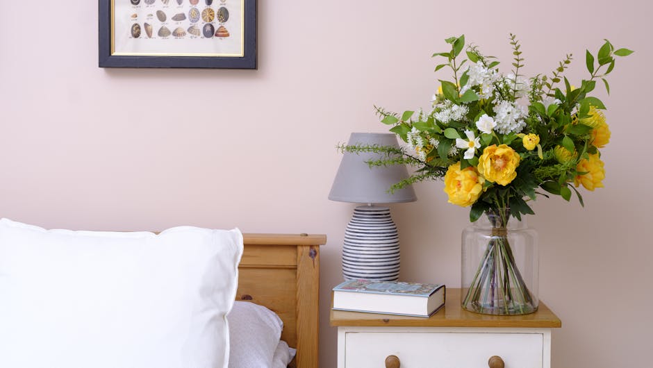 Faux yellow sensational bouquet in pink bedroom
